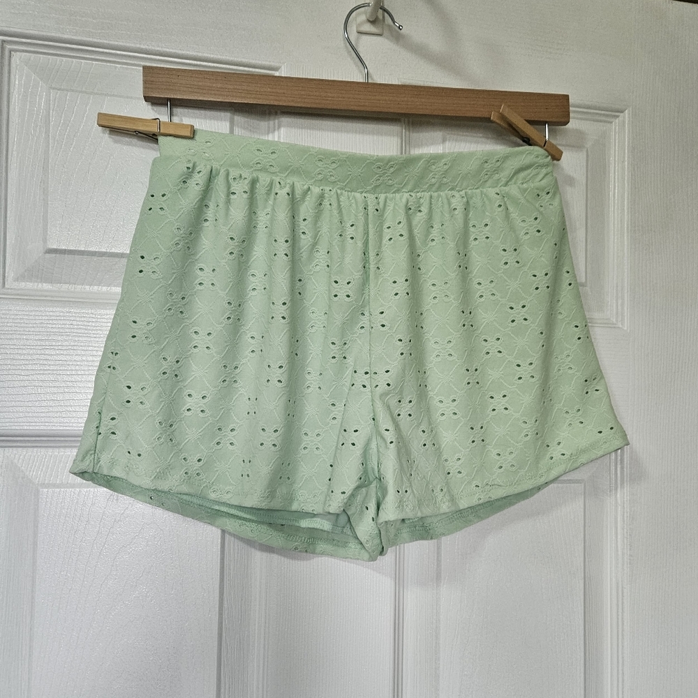 Mint green eyelet linen shorts